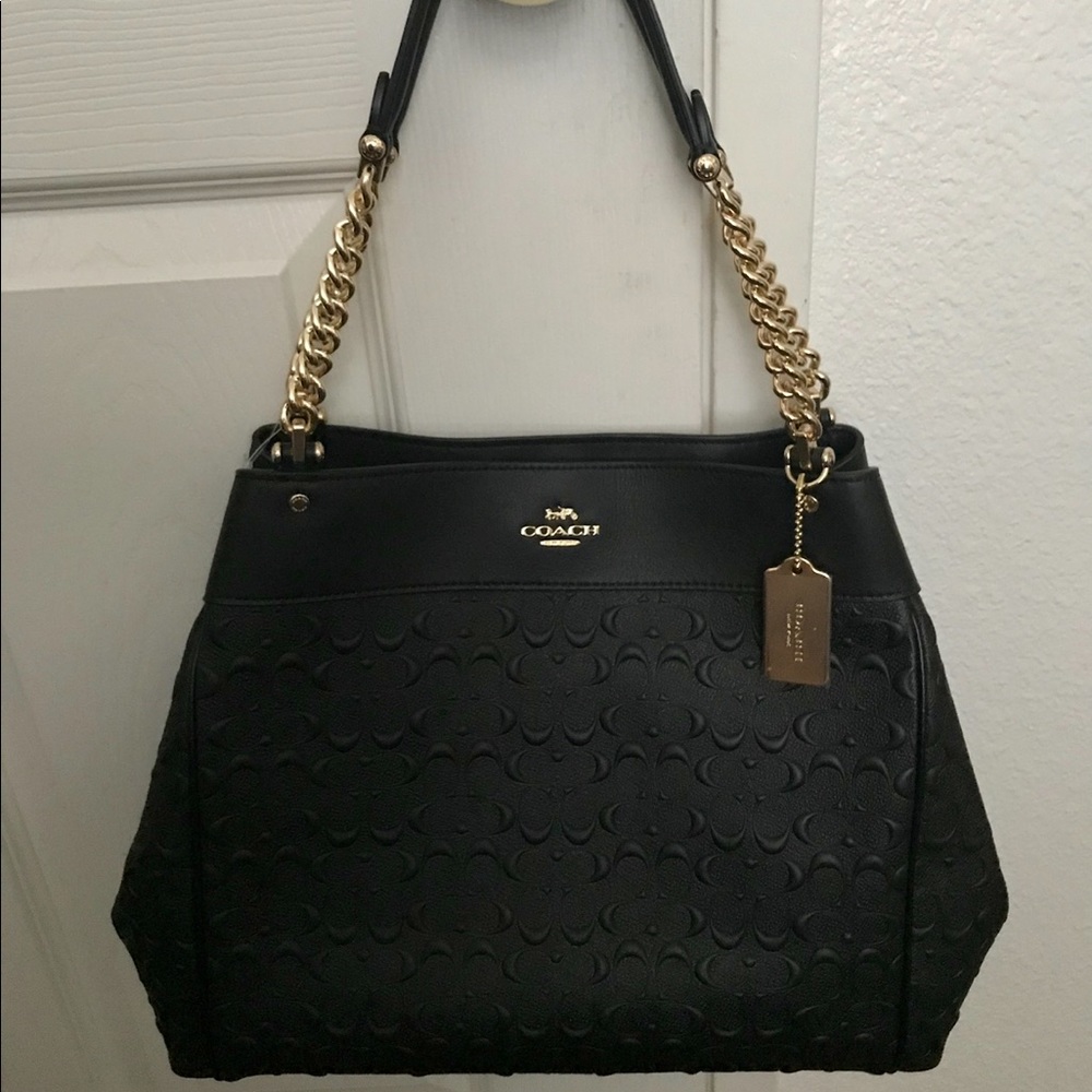 Coach black purse never used